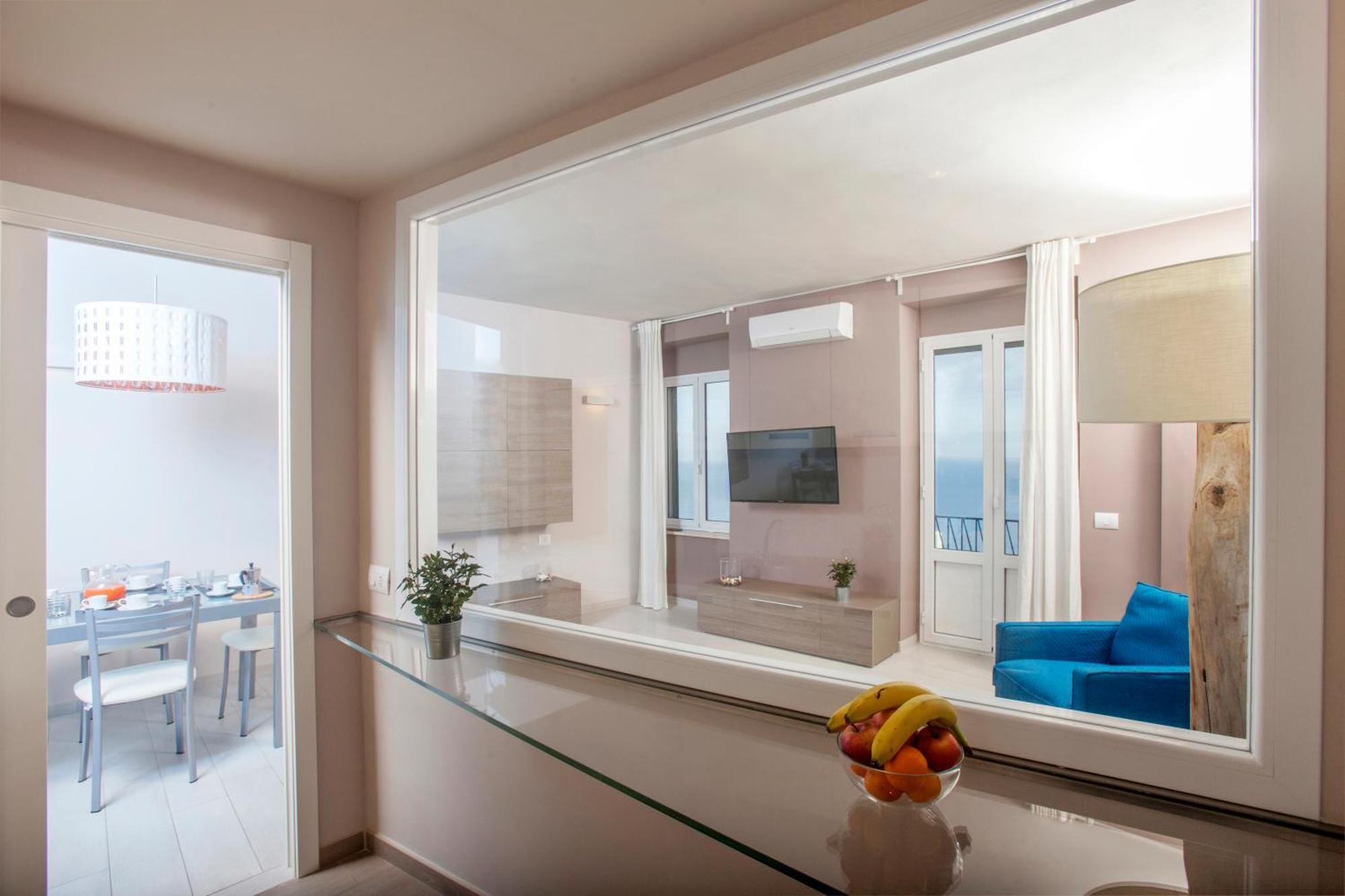 Апартаменты La Casa Al Mare Порто Санто Стефано Экстерьер фото