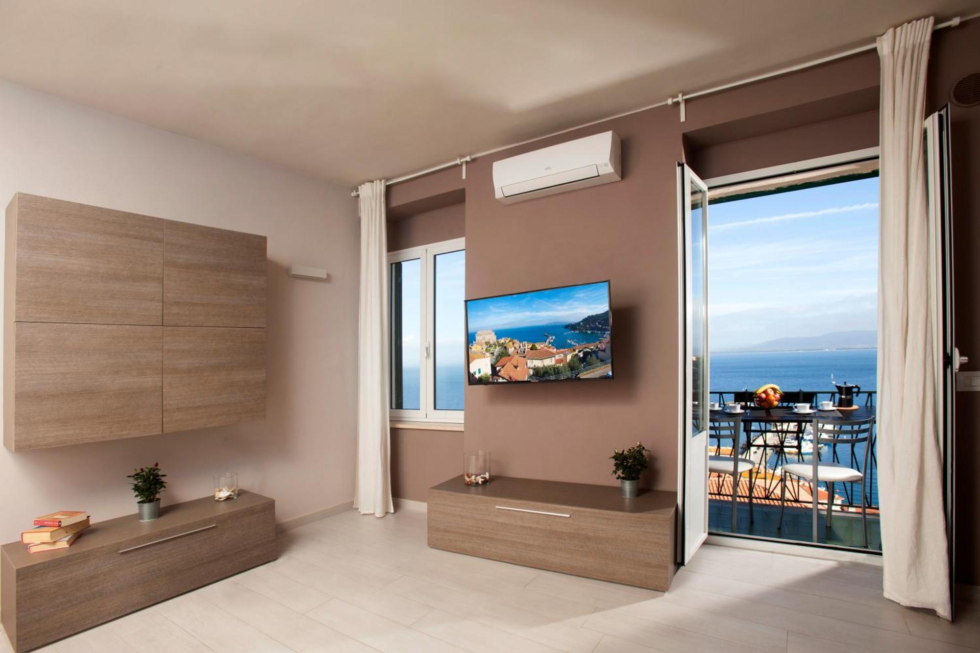Апартаменты La Casa Al Mare Порто Санто Стефано Экстерьер фото